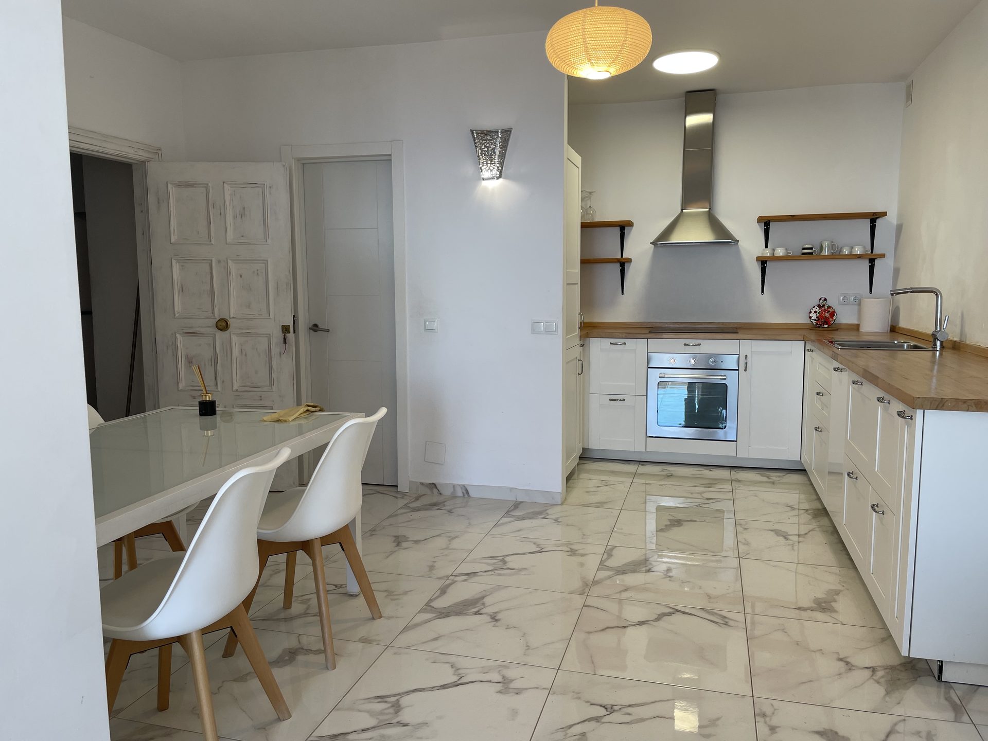 Fully equipped kitchen beside the dining area
