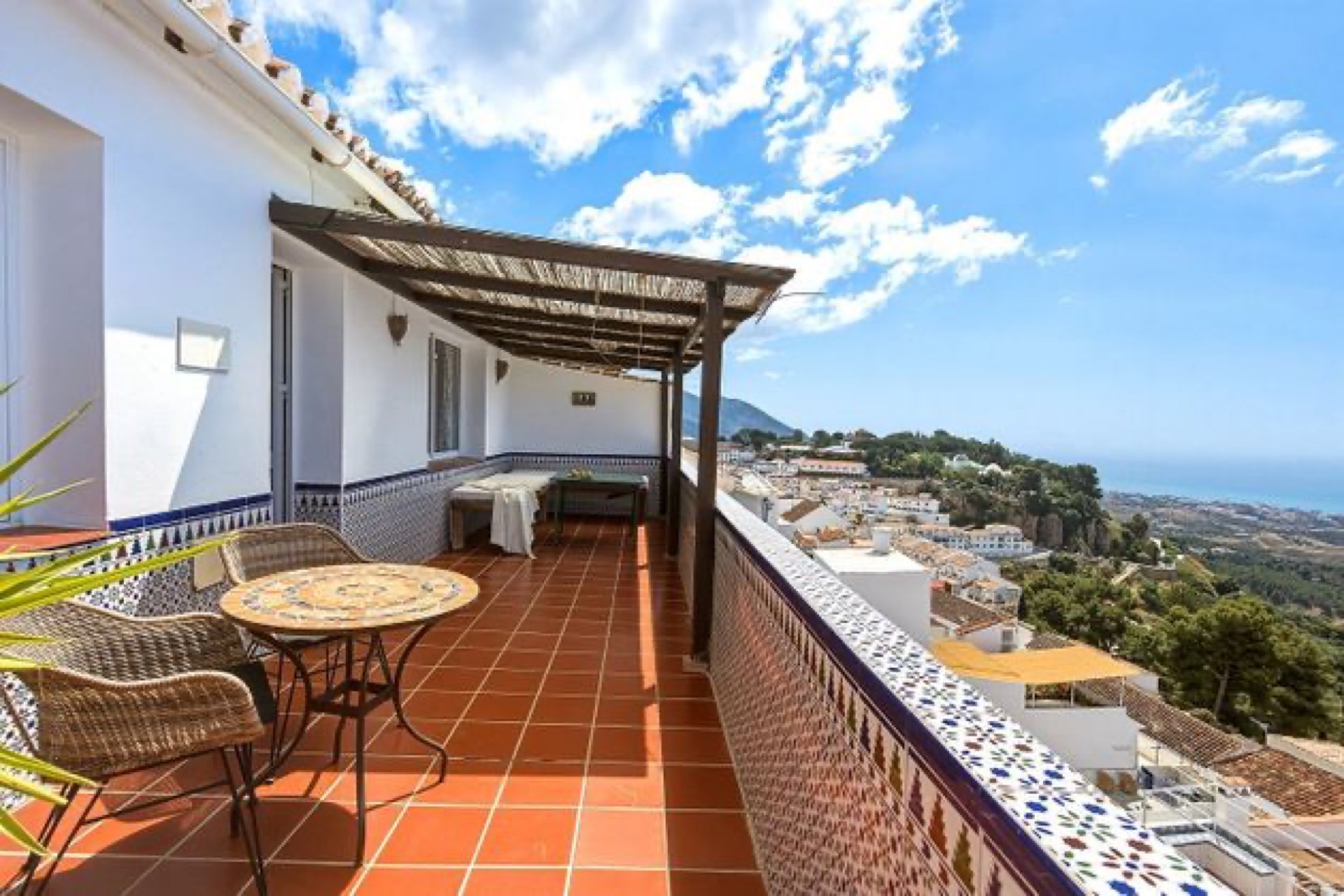 Long south-facing terrace with Mediterranean views